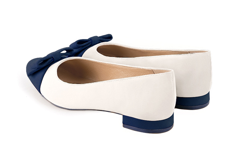 Women's navy blue and off white elegant ballet flats, with low heels. Round toe. Flat block heels - Rear view